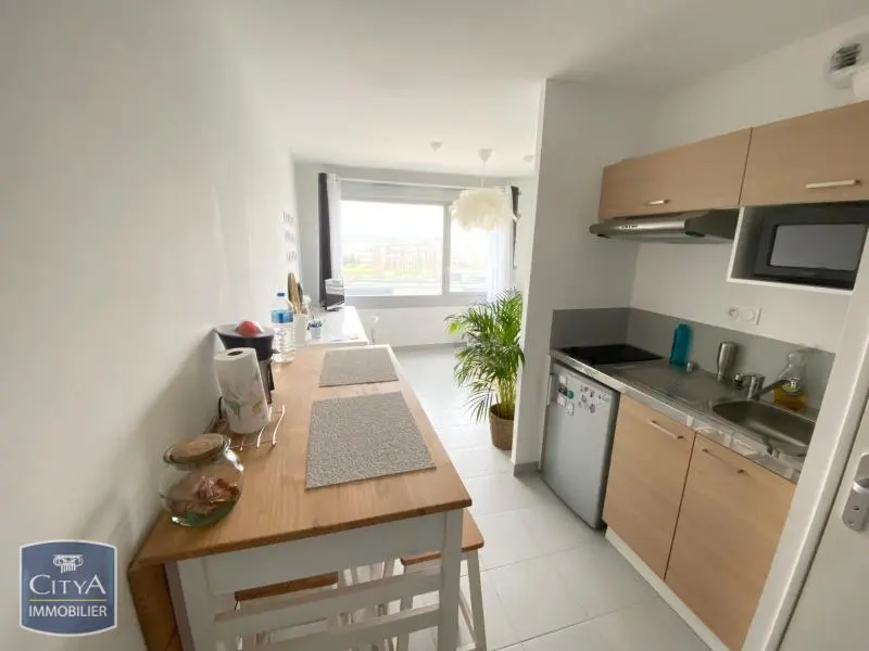 Photo 1 Appartement 1 pièce 21.82m²