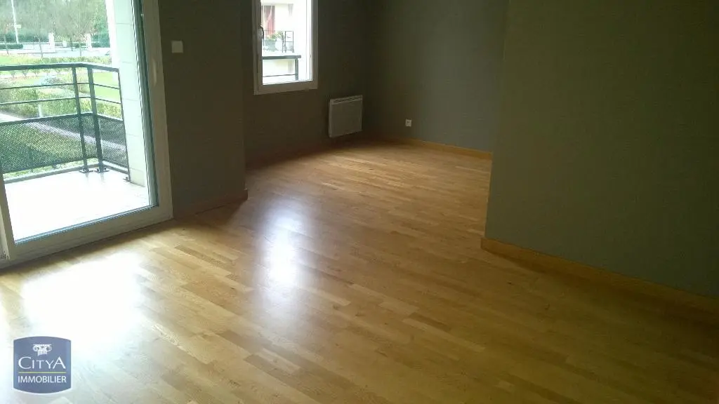 Photo 2 Appartement 3 pièces 57.59m²