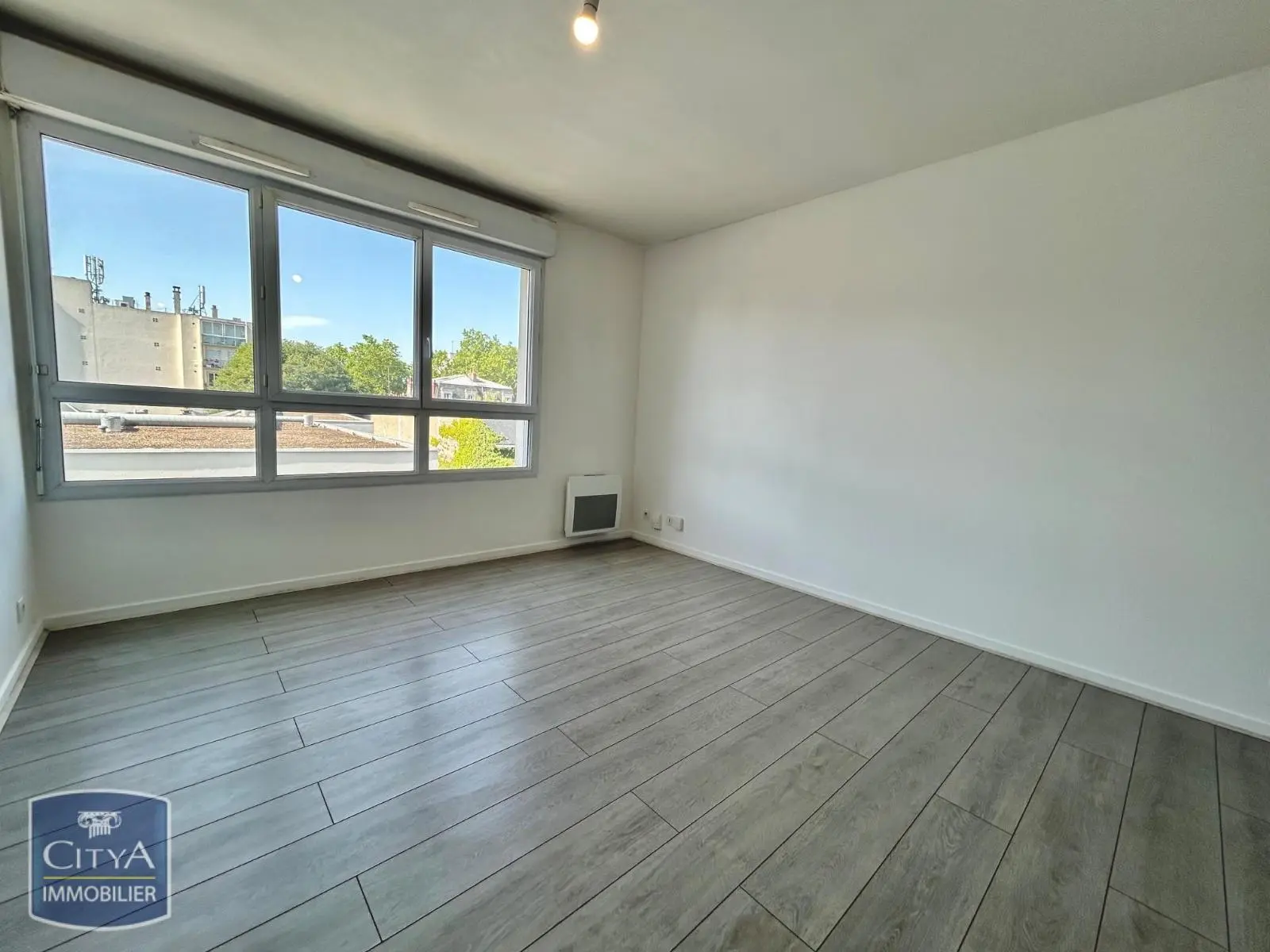 Photo 1 Appartement 1 pièce 27.56m²