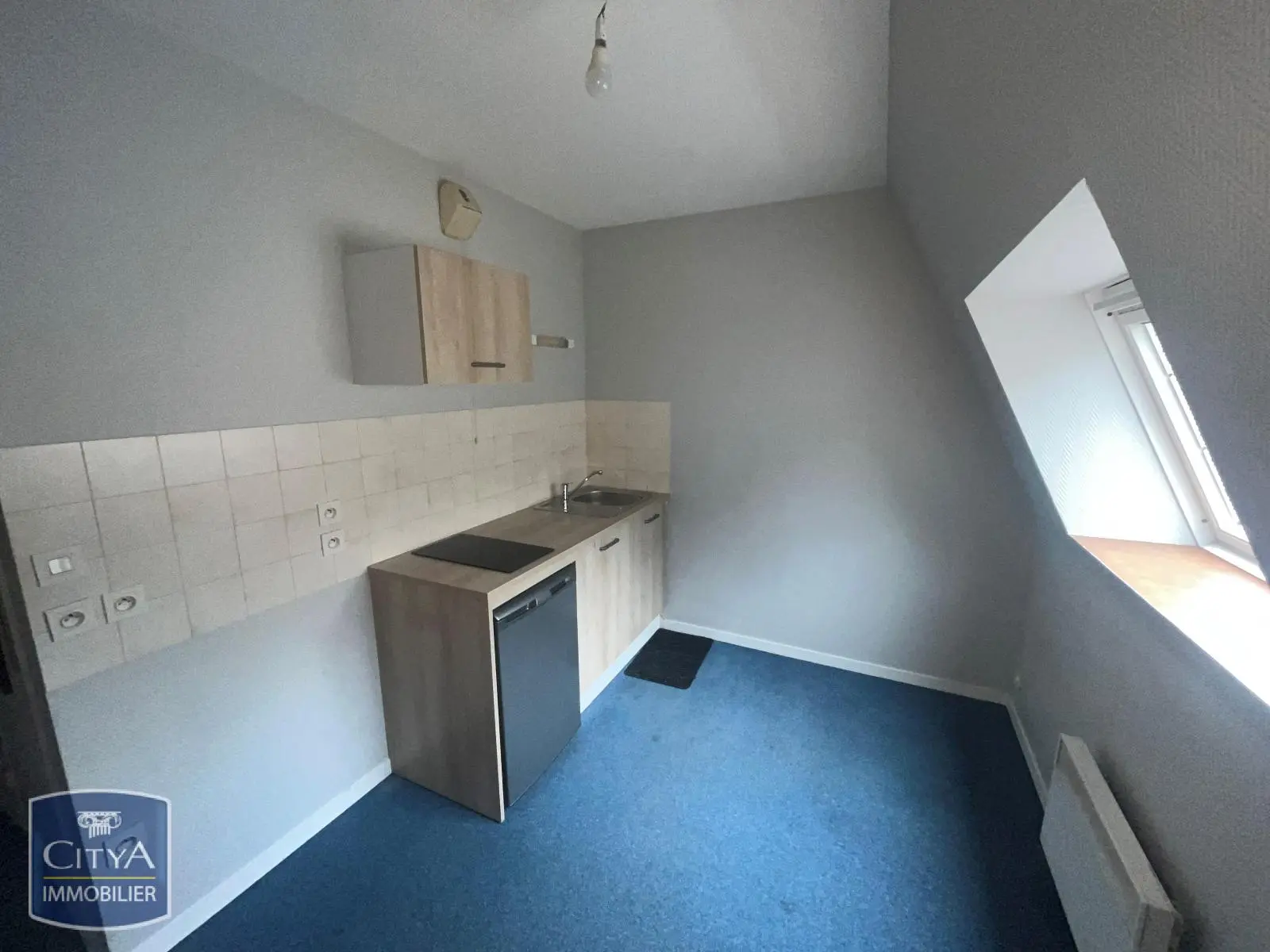 Photo 1 Appartement 1 pièce 12.13m²