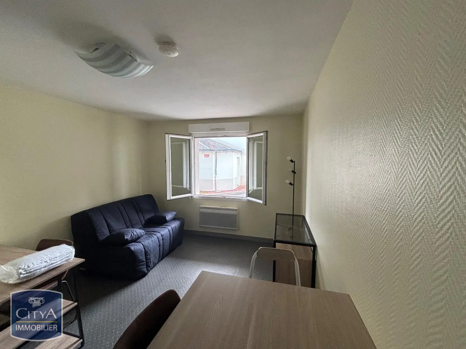 Photo 1 Appartement 1 pièce 21.09m²