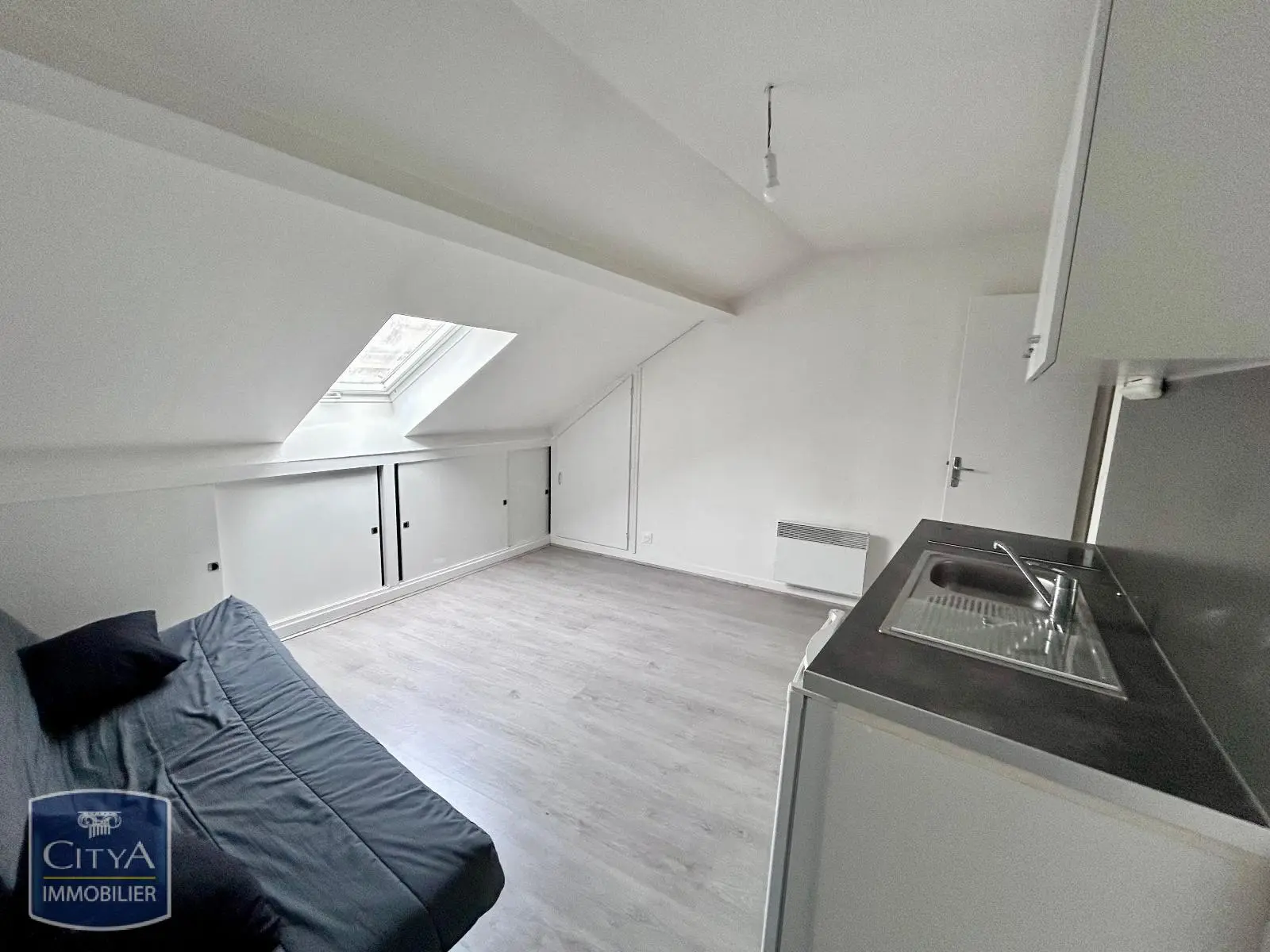 Photo 1 Appartement 1 pièce 14.61m²