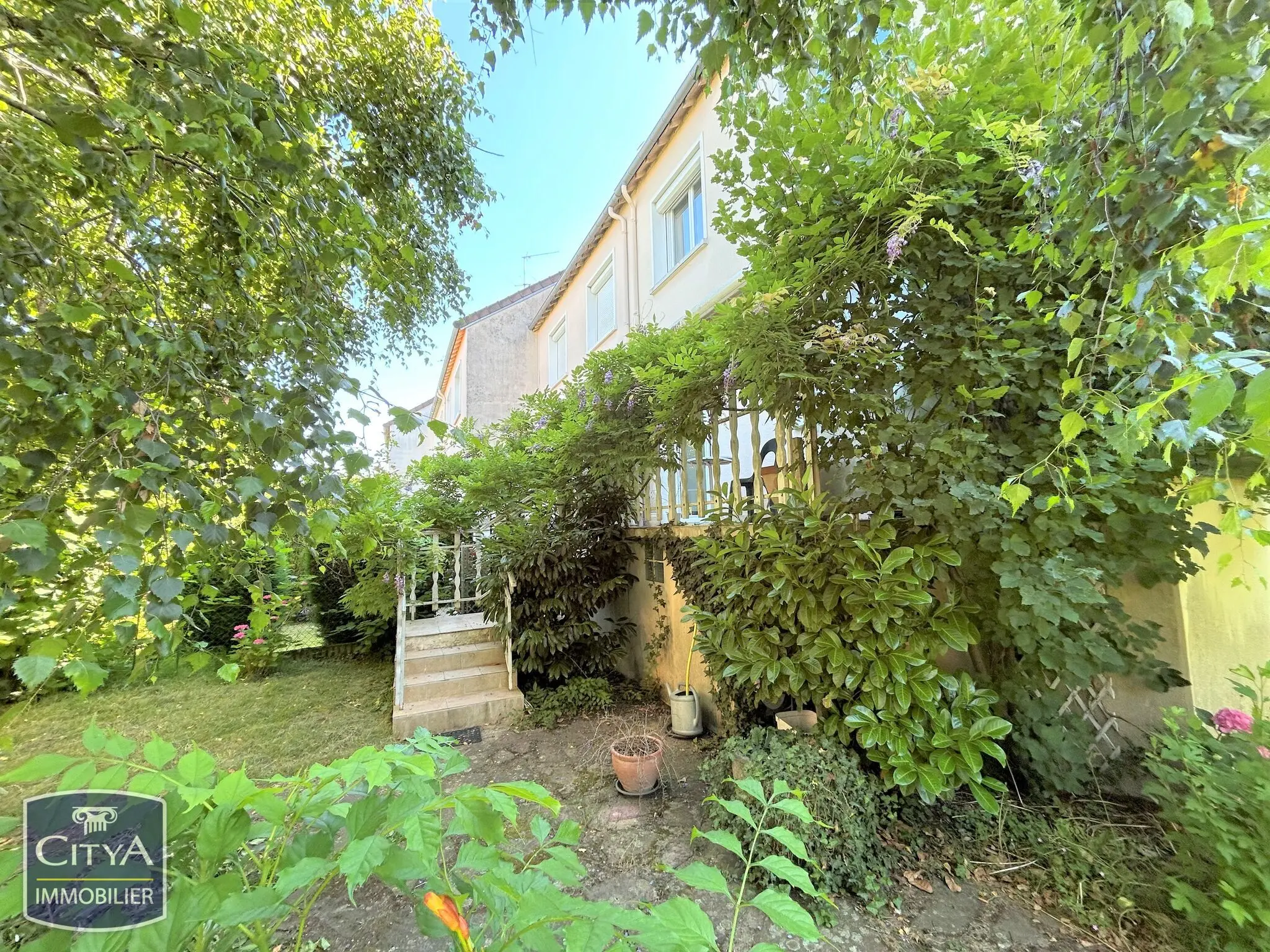 Photo 1 Maison 4 pièces 74m²