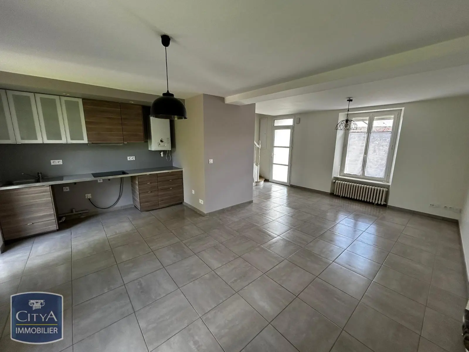 Photo 2 Maison 4 pièces 75m²