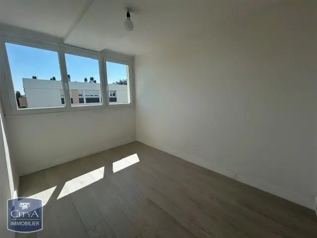 Photo 12 Appartement 4 pièces 65.96m²