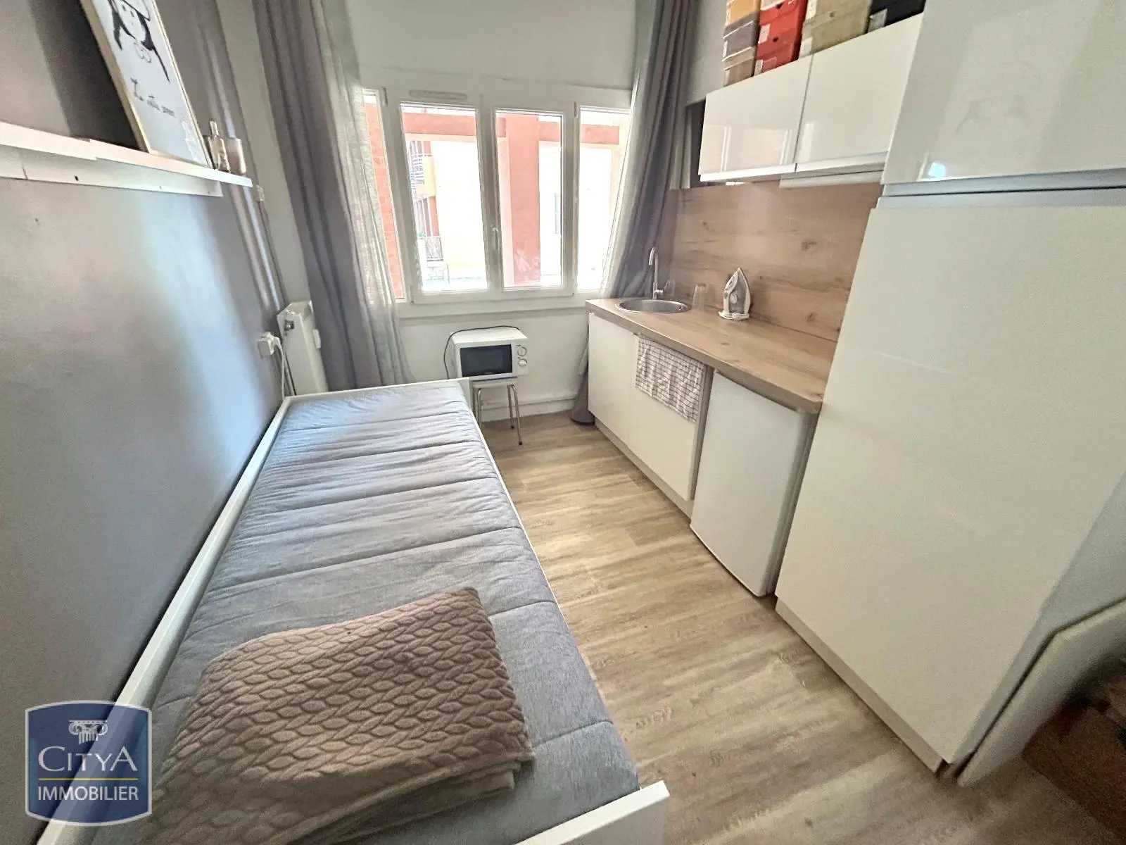 Photo 1 Appartement 1 pièce 9.4m²
