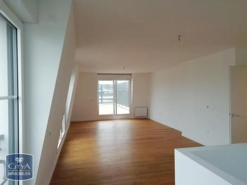Photo 1 Appartement 3 pièces 102.74m²