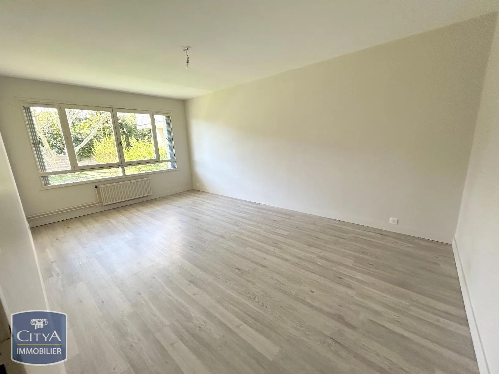 Photo 1 Appartement 3 pièces 61.86m²