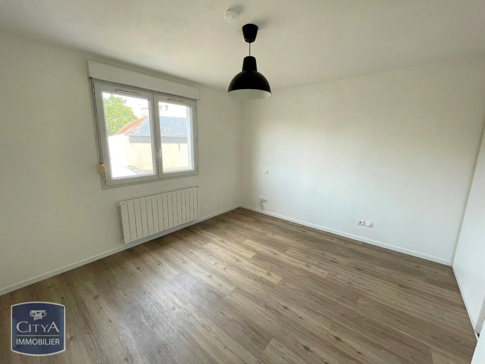 Photo 1 Appartement 1 pièce 21.84m²