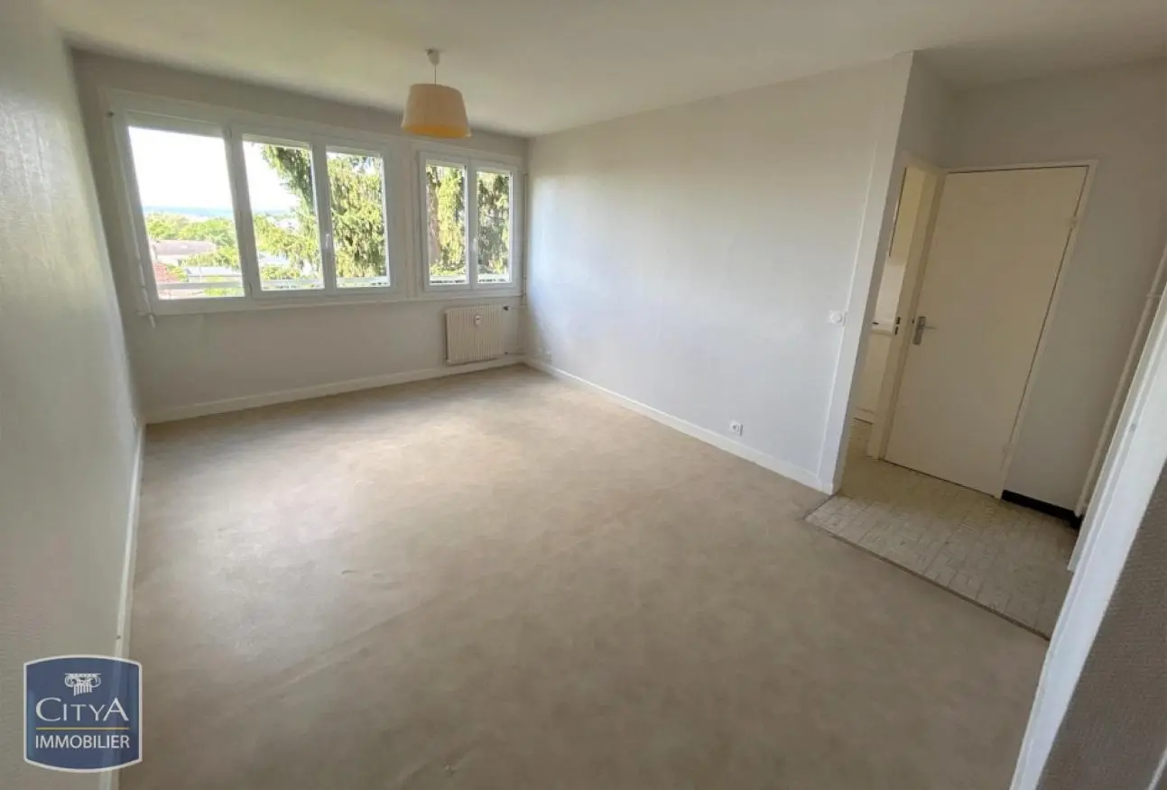 Photo 1 Appartement 1 pièce 33.87m²
