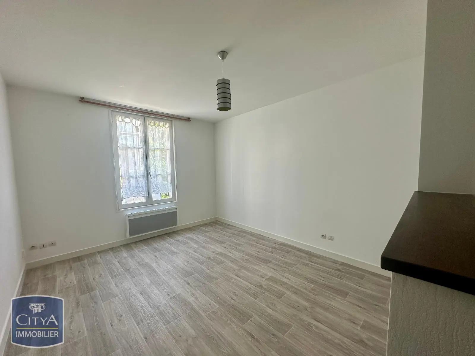 Photo 1 Appartement 1 pièce 21.63m²