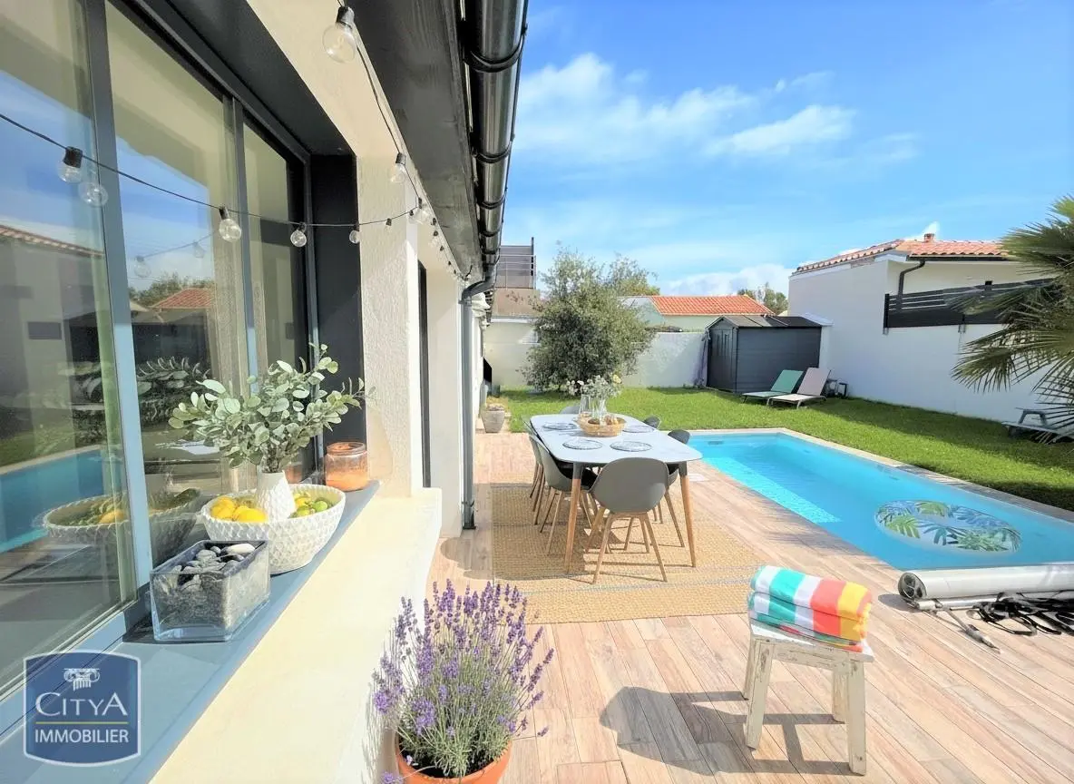 Photo 1 Maison 4 pièces 65m²