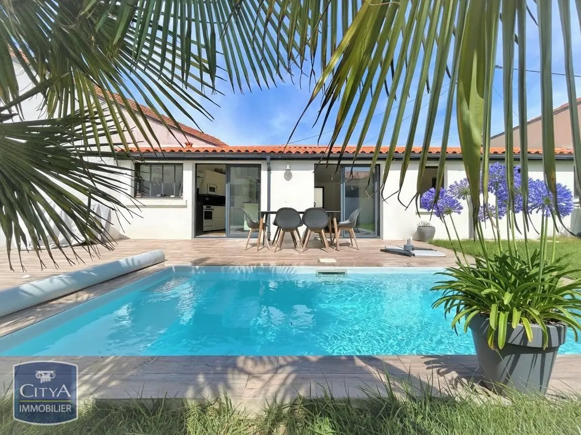 Photo 1 Maison 4 pièces 65m²