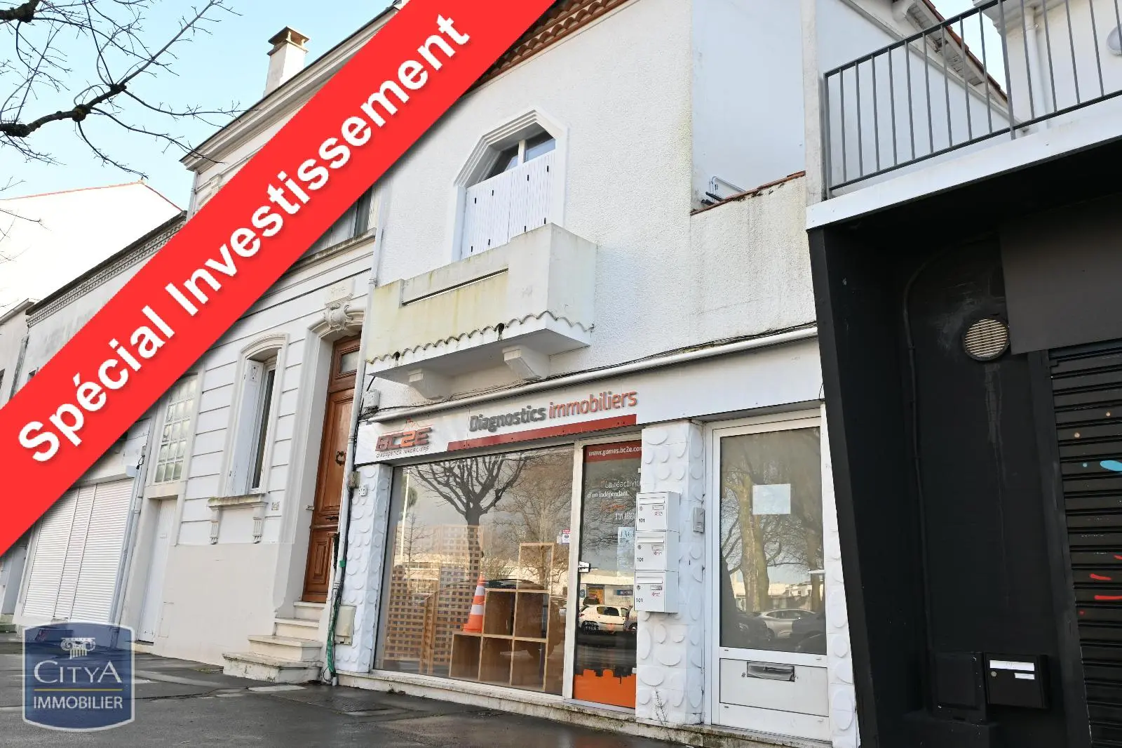 Photo 1 Immeuble 125.76m²