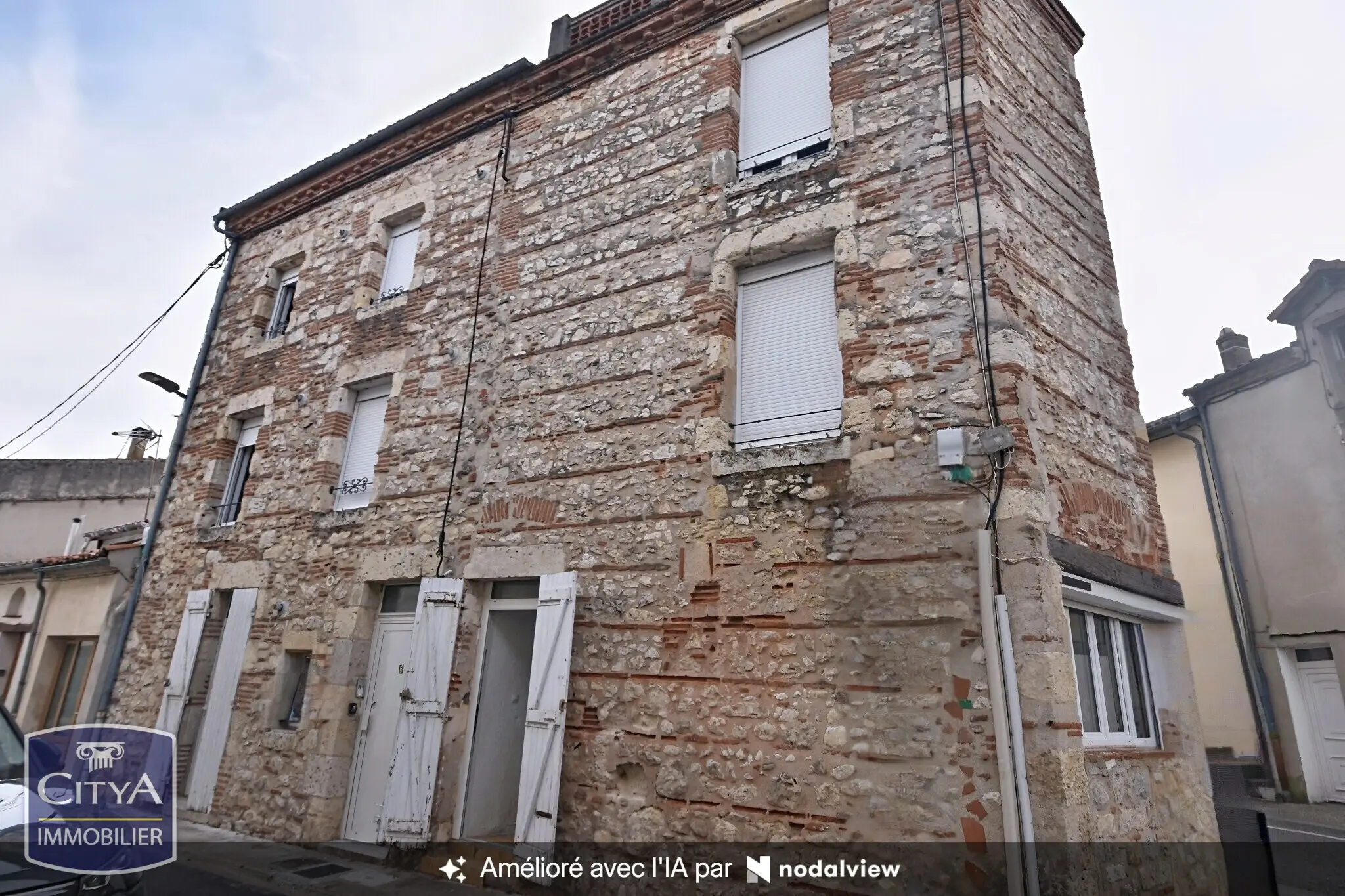 Photo 1 Immeuble 200m²