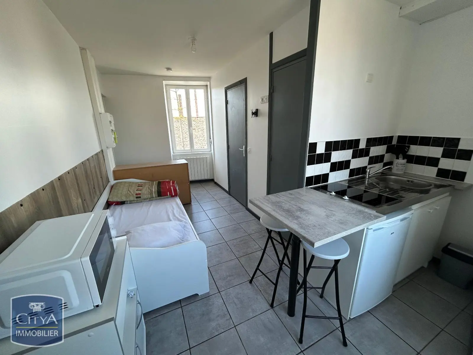 Photo 1 Appartement 1 pièce 14.7m²