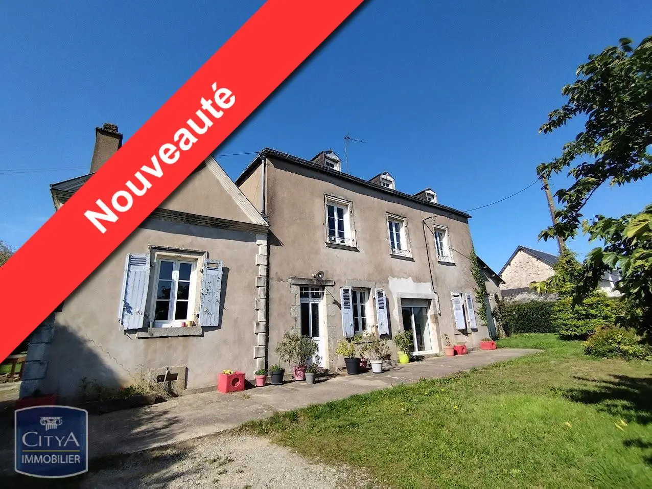 Photo 1 Maison 8 pièces 166m²