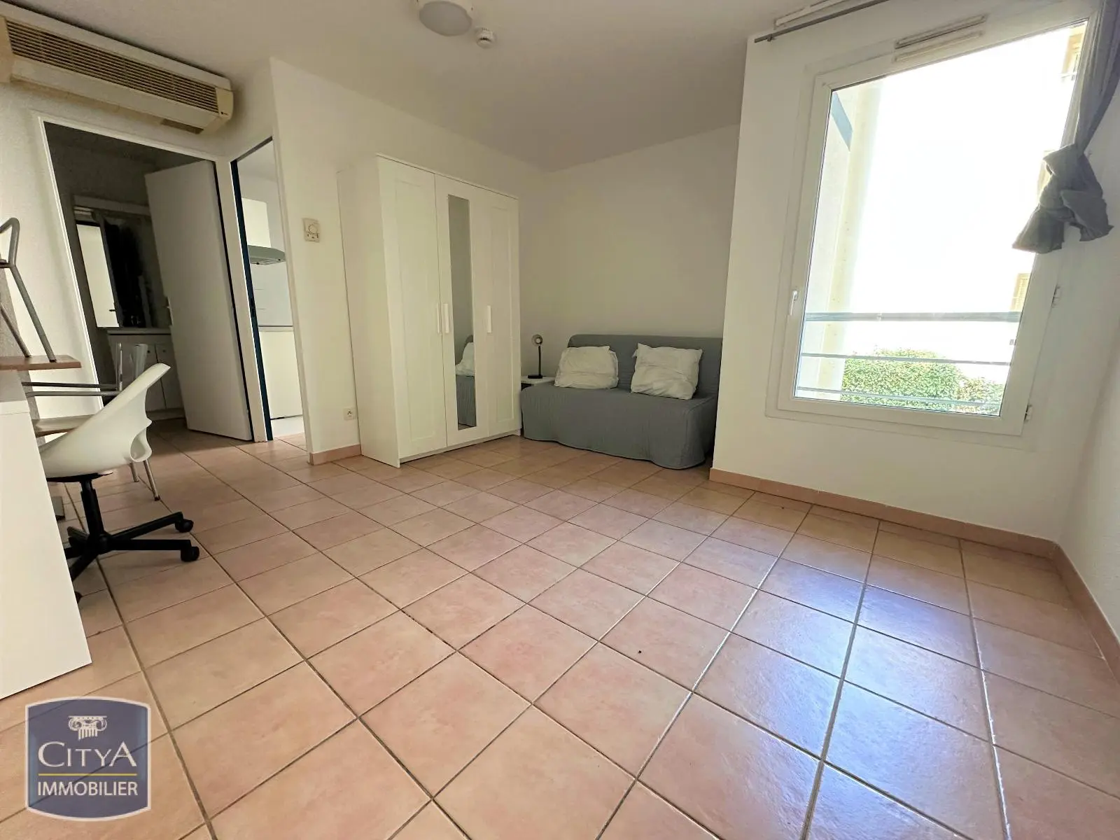 Photo 1 Appartement 1 pièce 24.56m²