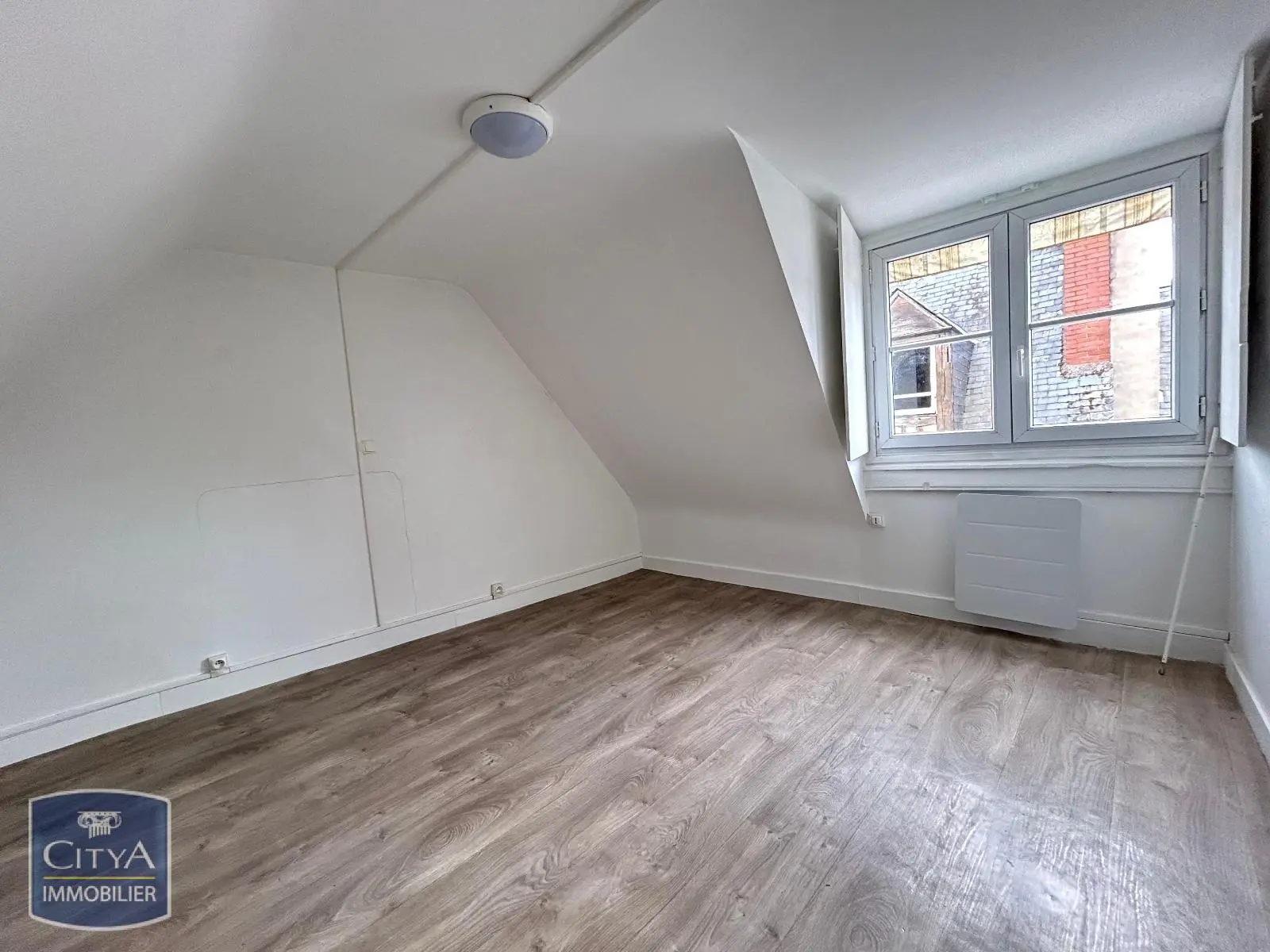 Photo 1 Appartement 1 pièce 12.55m²