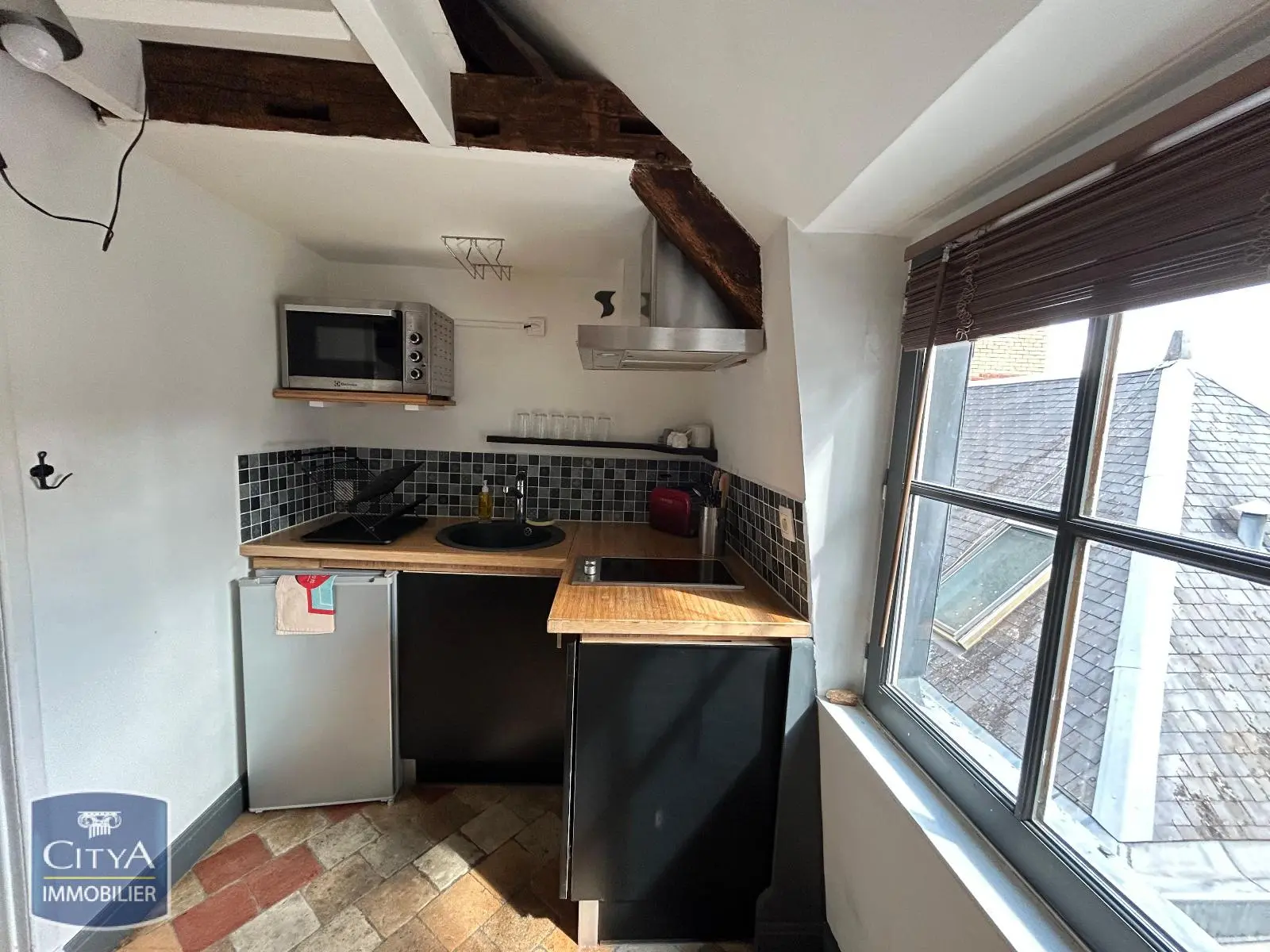 Photo 1 Appartement 1 pièce 19.56m²
