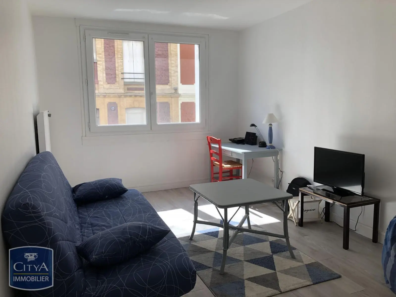 Photo 1 Appartement 1 pièce 32.84m²