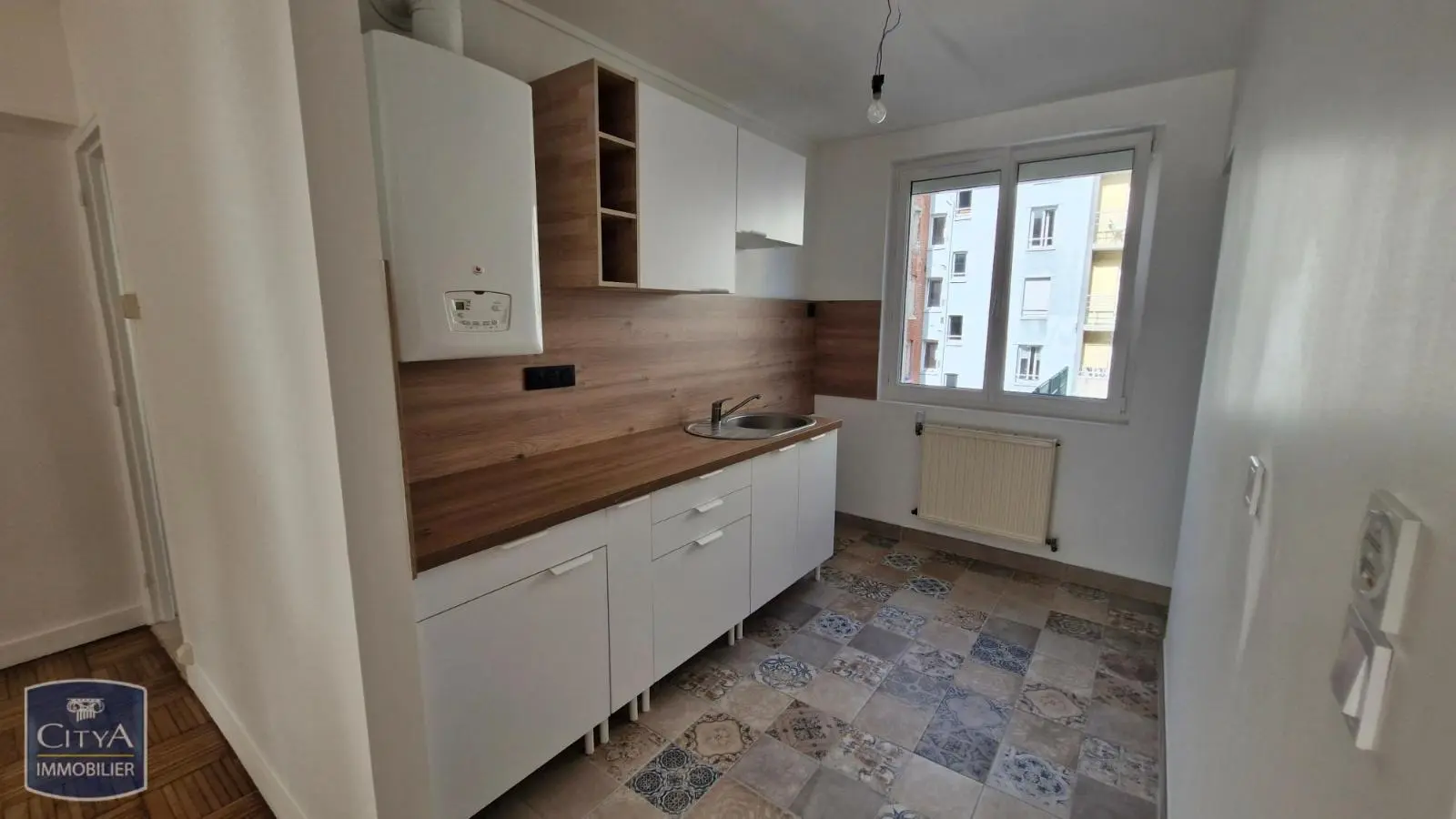 Photo 2 Appartement 3 pièces 58.04m²