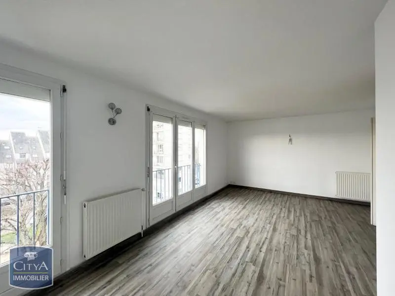 Photo 1 Appartement 3 pièces 63.64m²