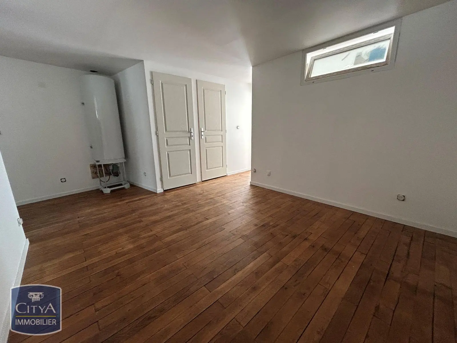 Photo 1 Appartement 1 pièce 9.86m²