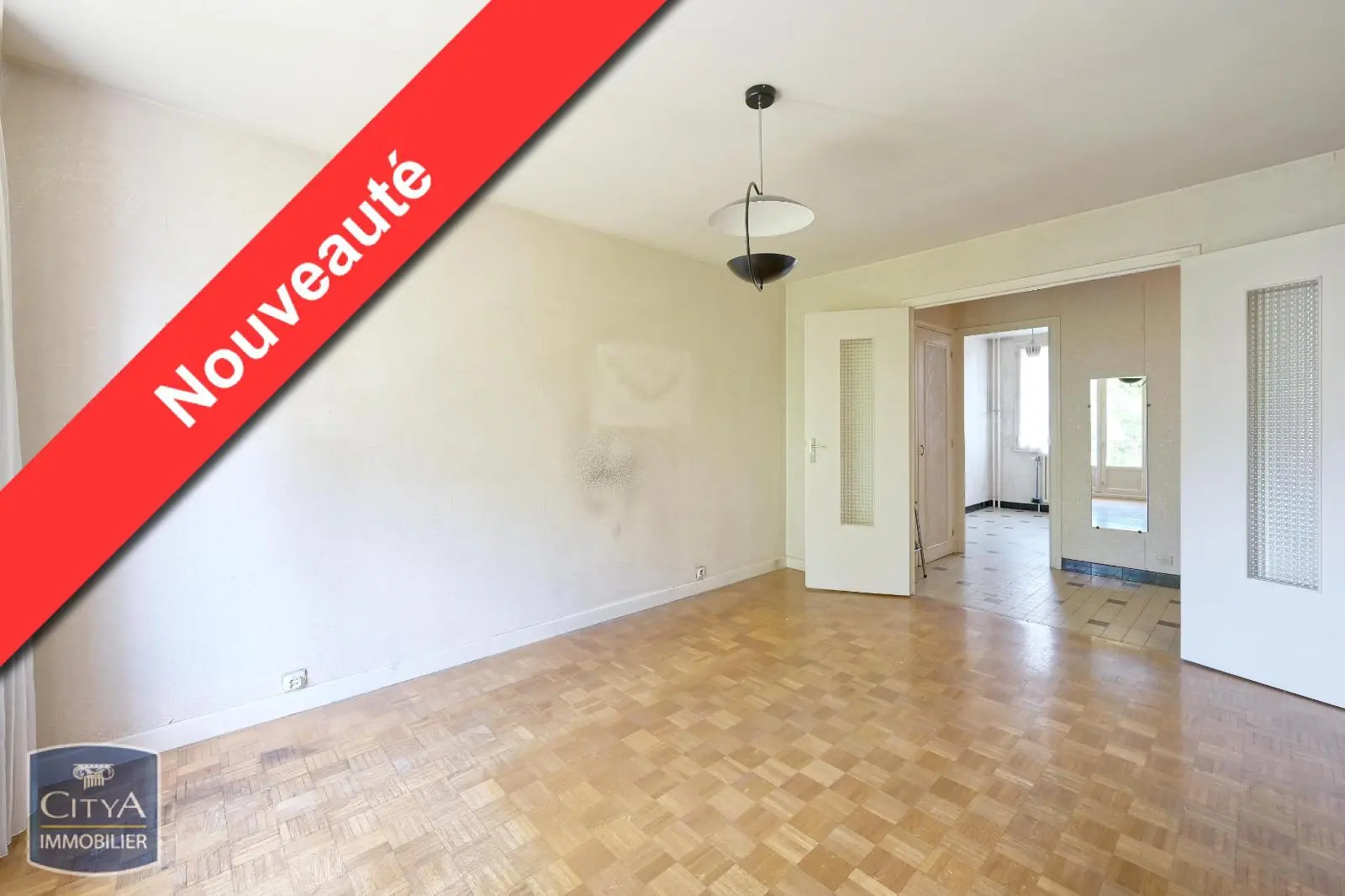 Photo 1 Appartement 3 pièces 56.01m²