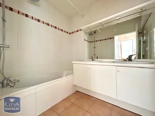 Photo 11 Appartement 4 pièces 101.85m²