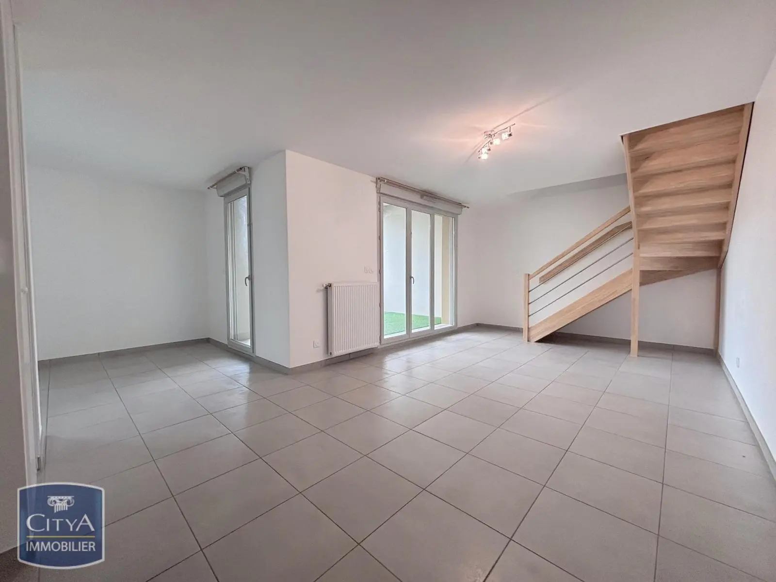 Photo 1 Appartement 4 pièces 97.77m²