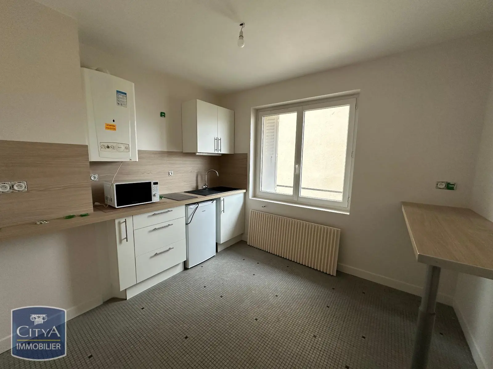 Photo 1 Appartement 1 pièce 28.25m²