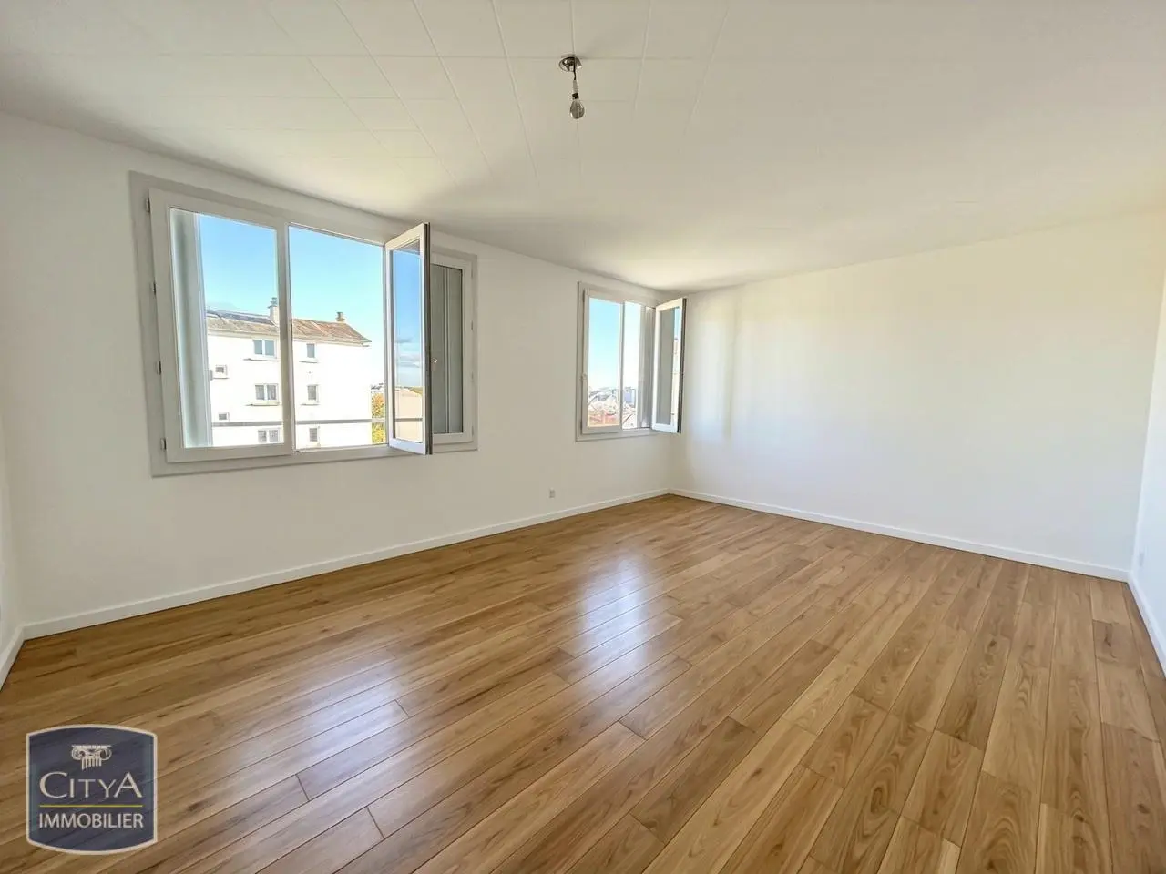 Photo 1 Appartement 3 pièces 61.54m²