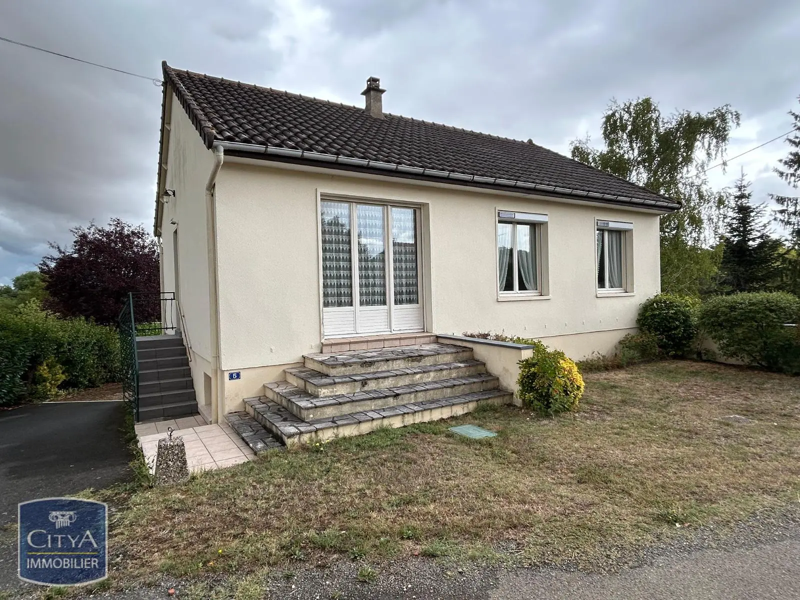 Photo 1 Maison 4 pièces 75m²