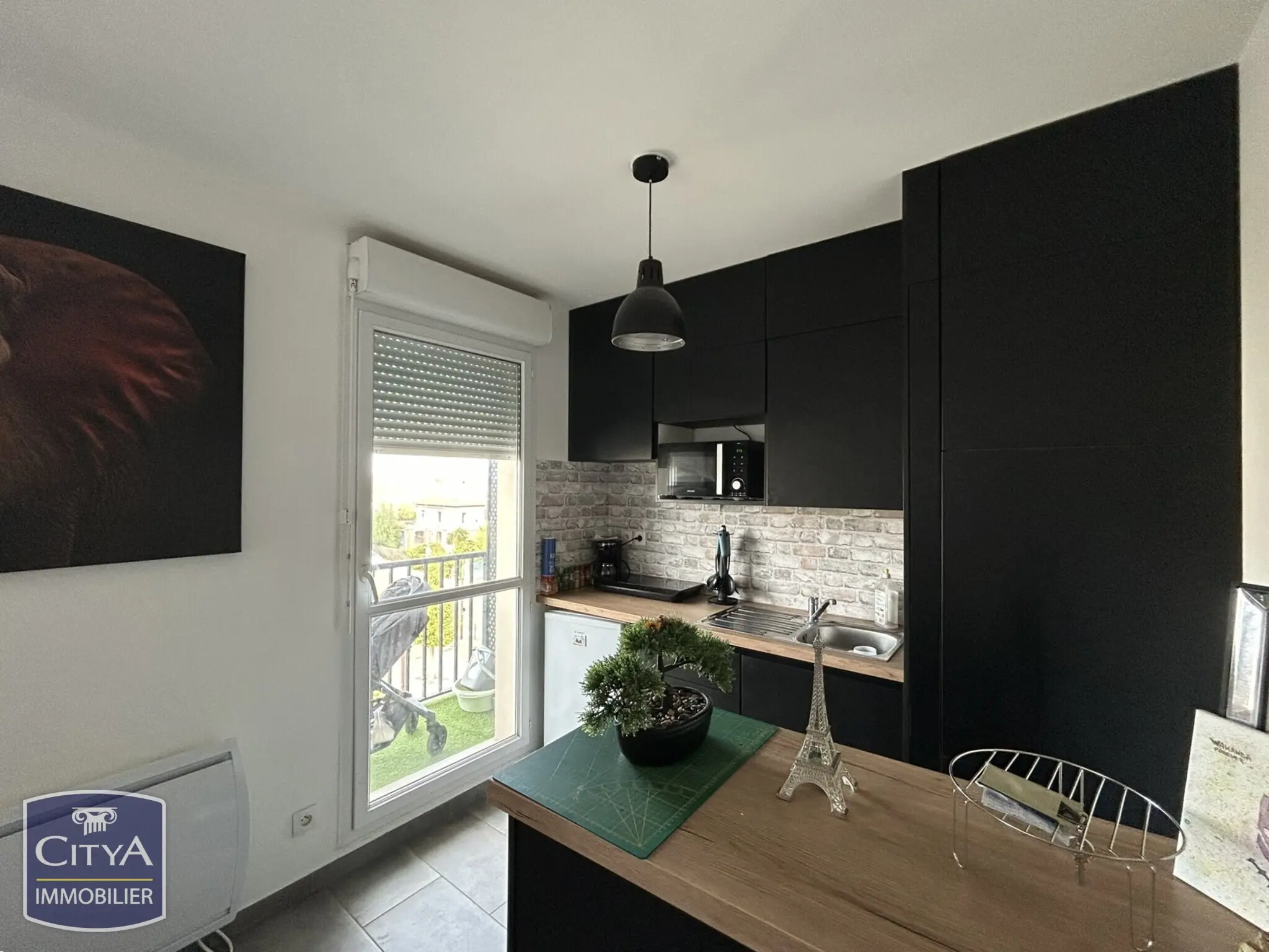 Photo 2 Appartement 1 pièce 24.56m²