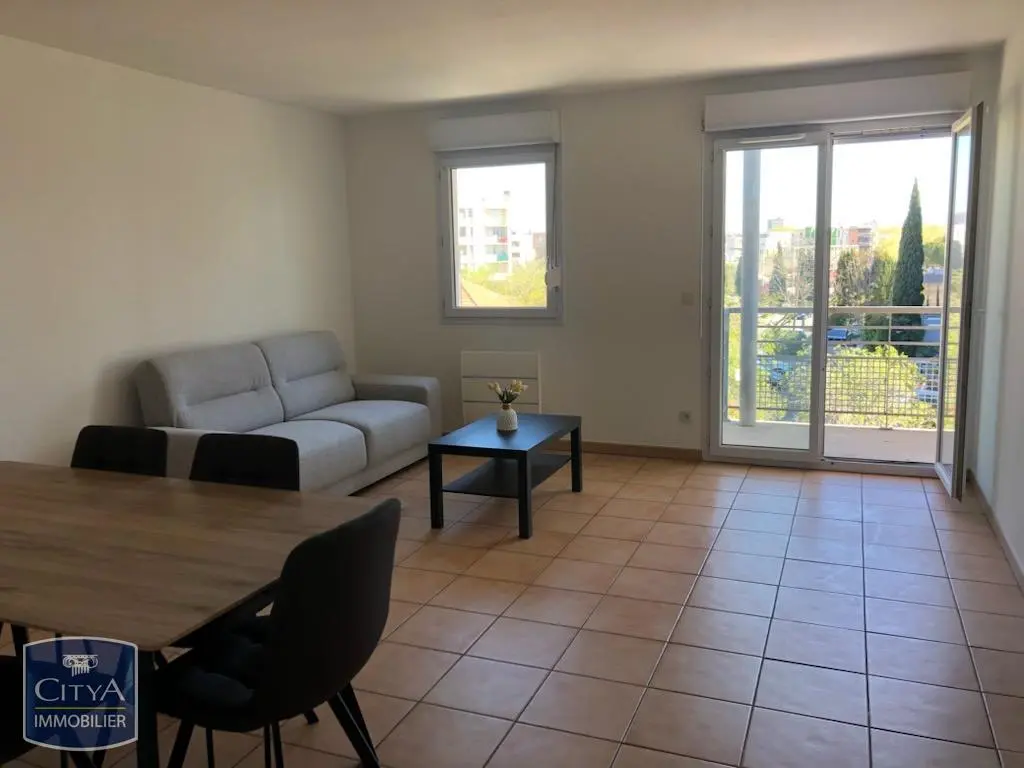 Photo 1 Appartement 3 pièces 64.77m²