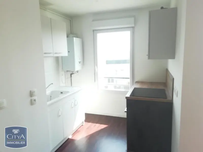 Photo 2 Appartement 3 pièces 60.49m²