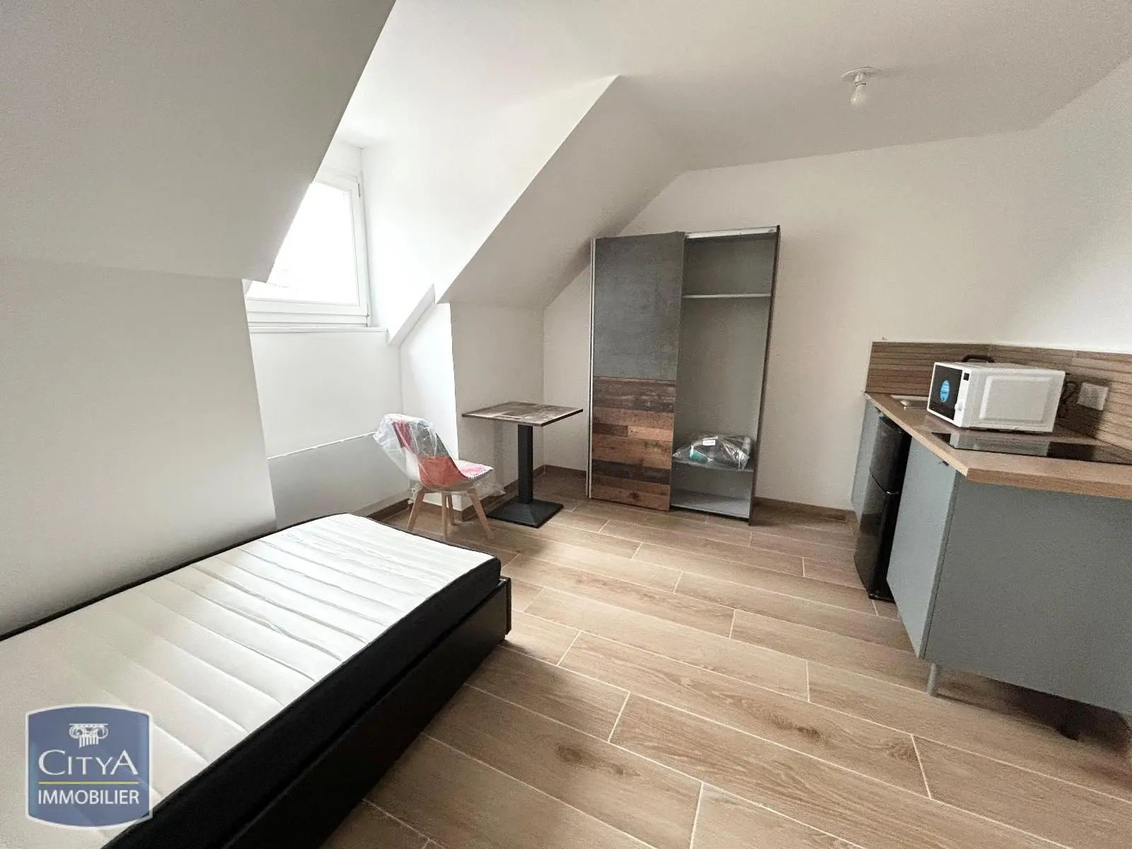 Photo 1 Appartement 1 pièce 14.38m²