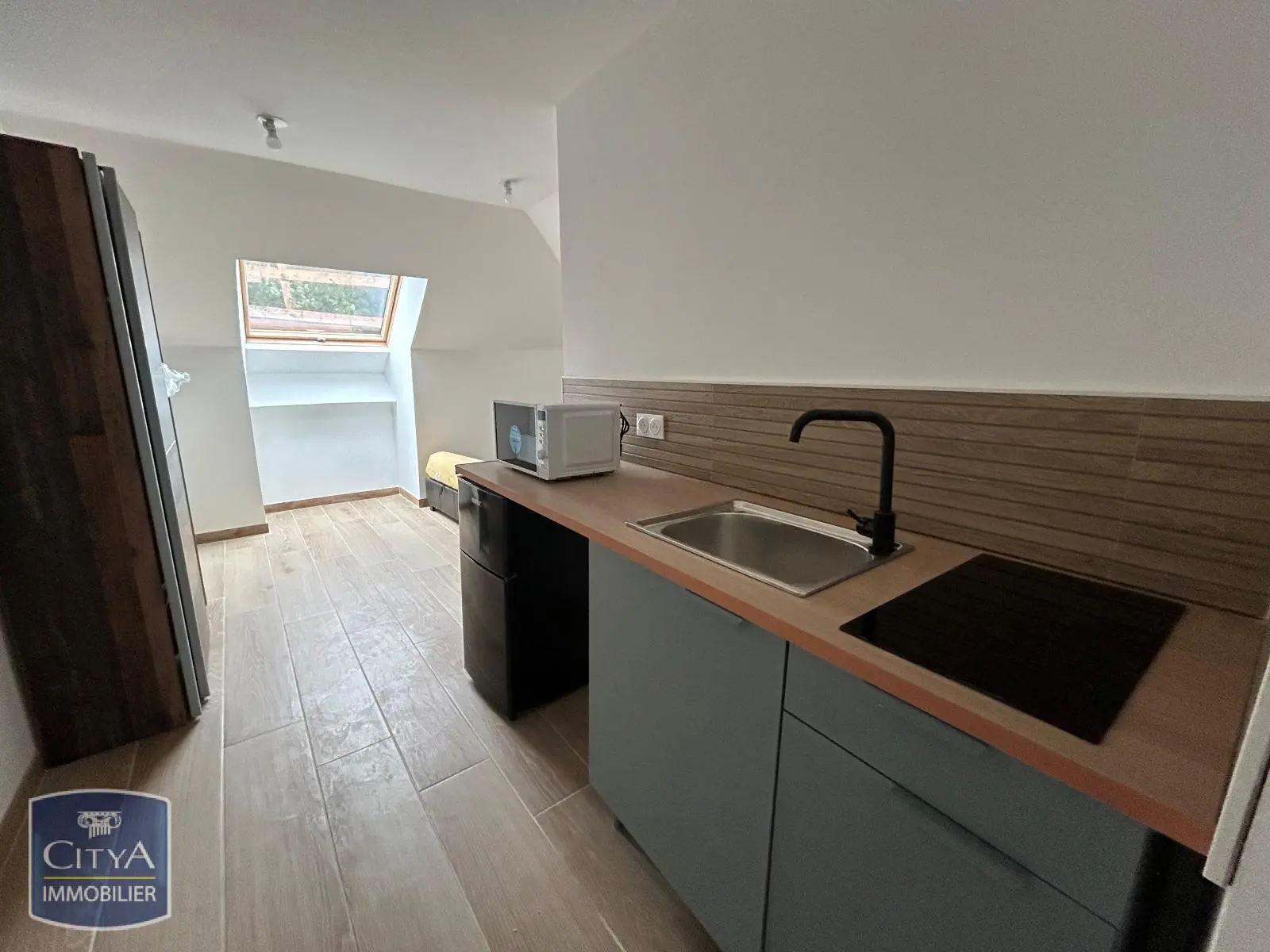 Photo 1 Appartement 1 pièce 14.38m²