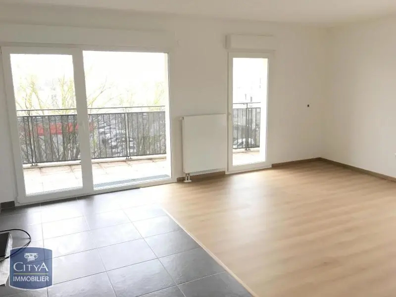 Photo 1 Appartement 3 pièces 62.57m²