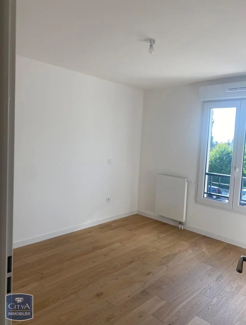 Photo 2 Appartement 3 pièces 54.09m²