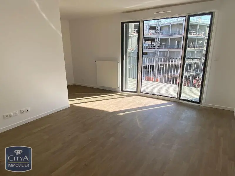 Photo 2 Appartement 3 pièces 62.57m²