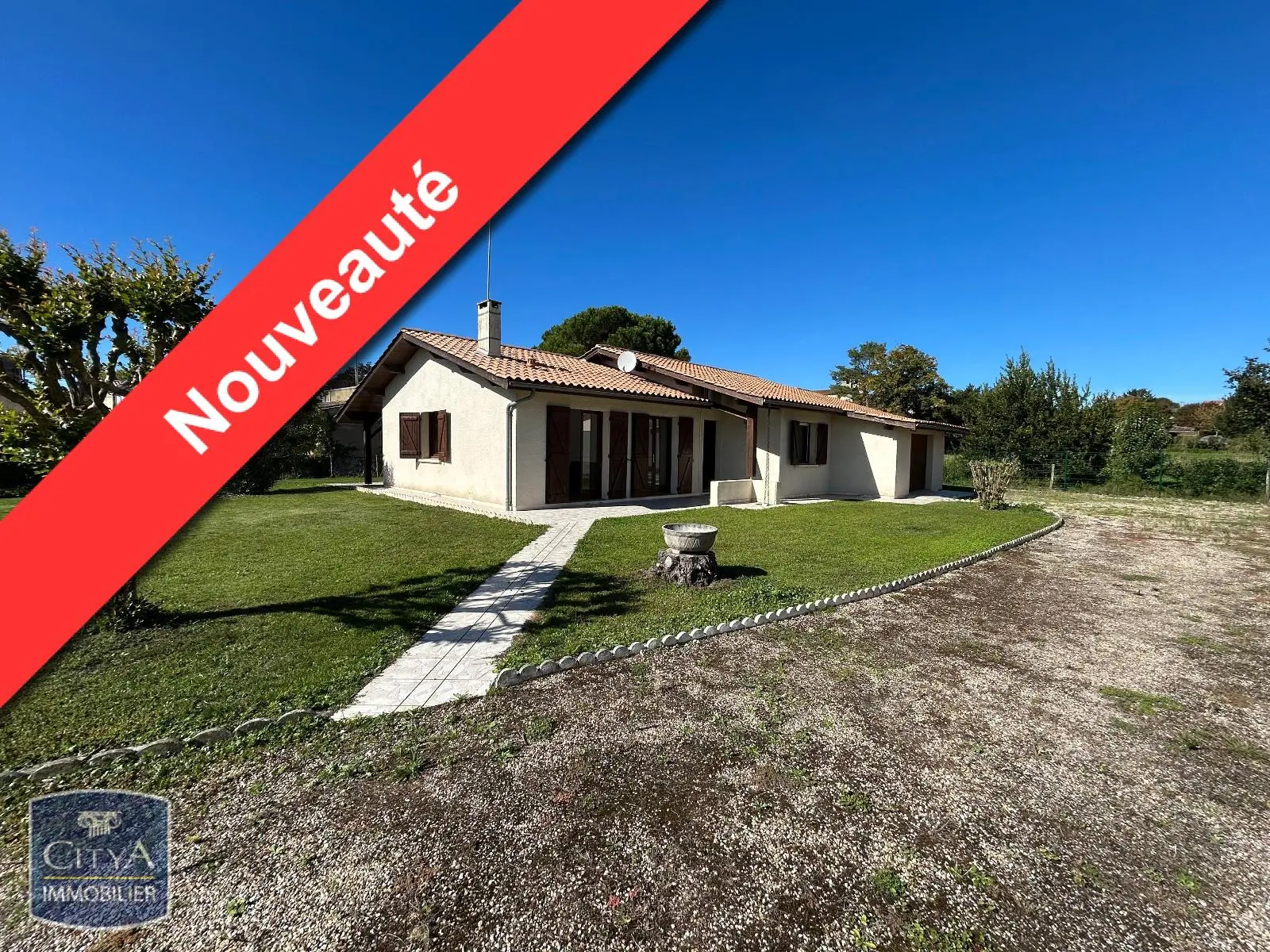 Photo 1 Maison 4 pièces 100m²