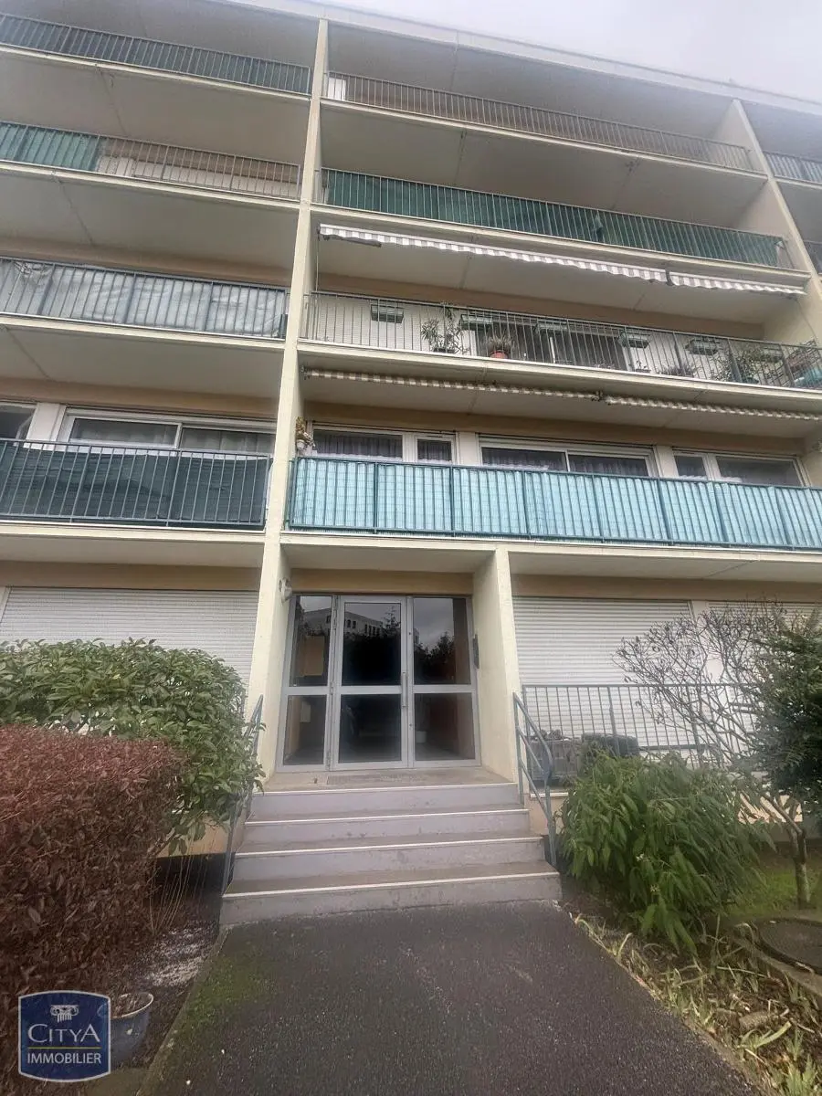 Photo 1 Appartement 4 pièces 77m²