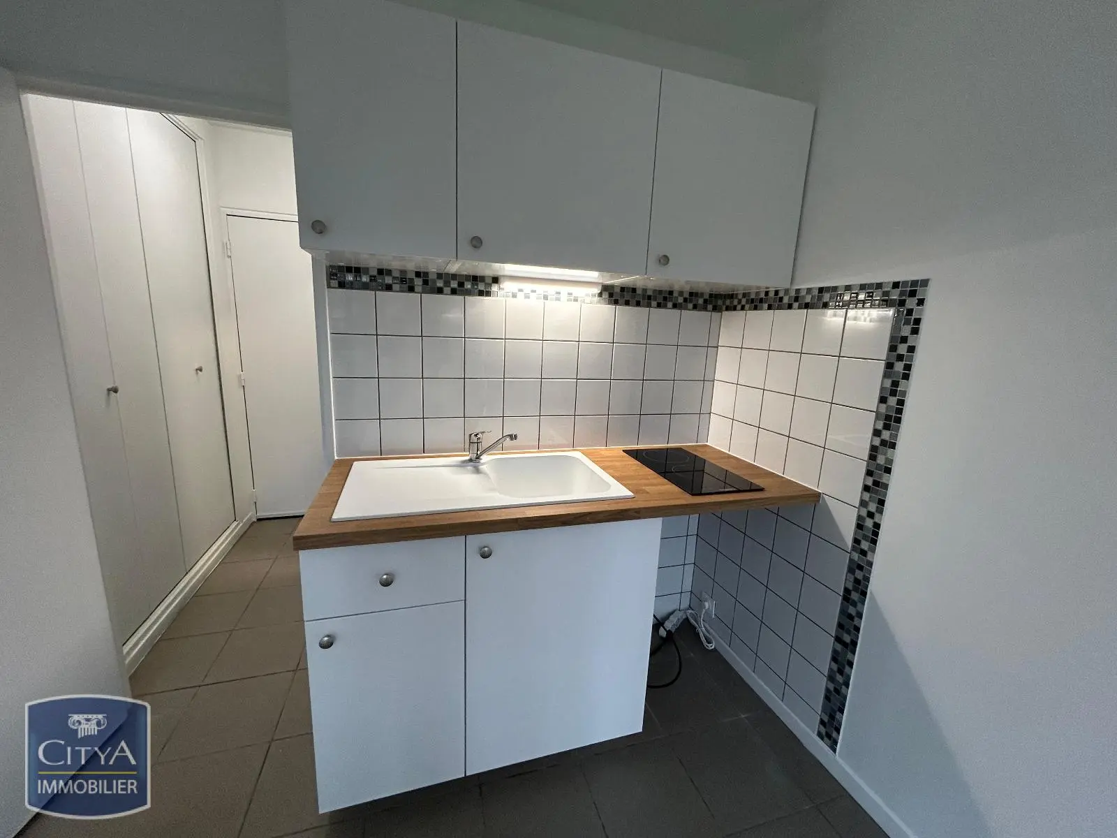 Photo 1 Appartement 1 pièce 14.57m²