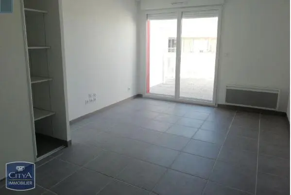 Photo 1 Appartement 1 pièce 30.98m²