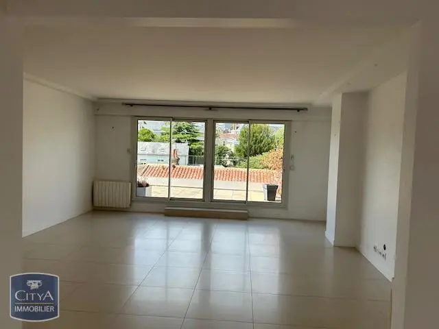Photo 1 Appartement 3 pièces 117m²