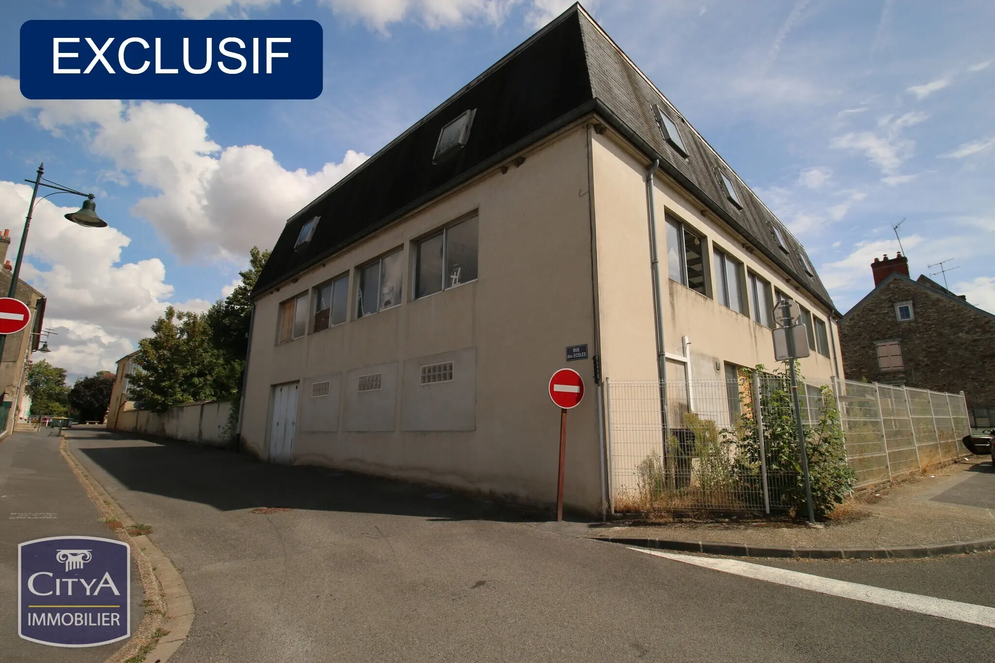 Photo 1 Immeuble 900m²