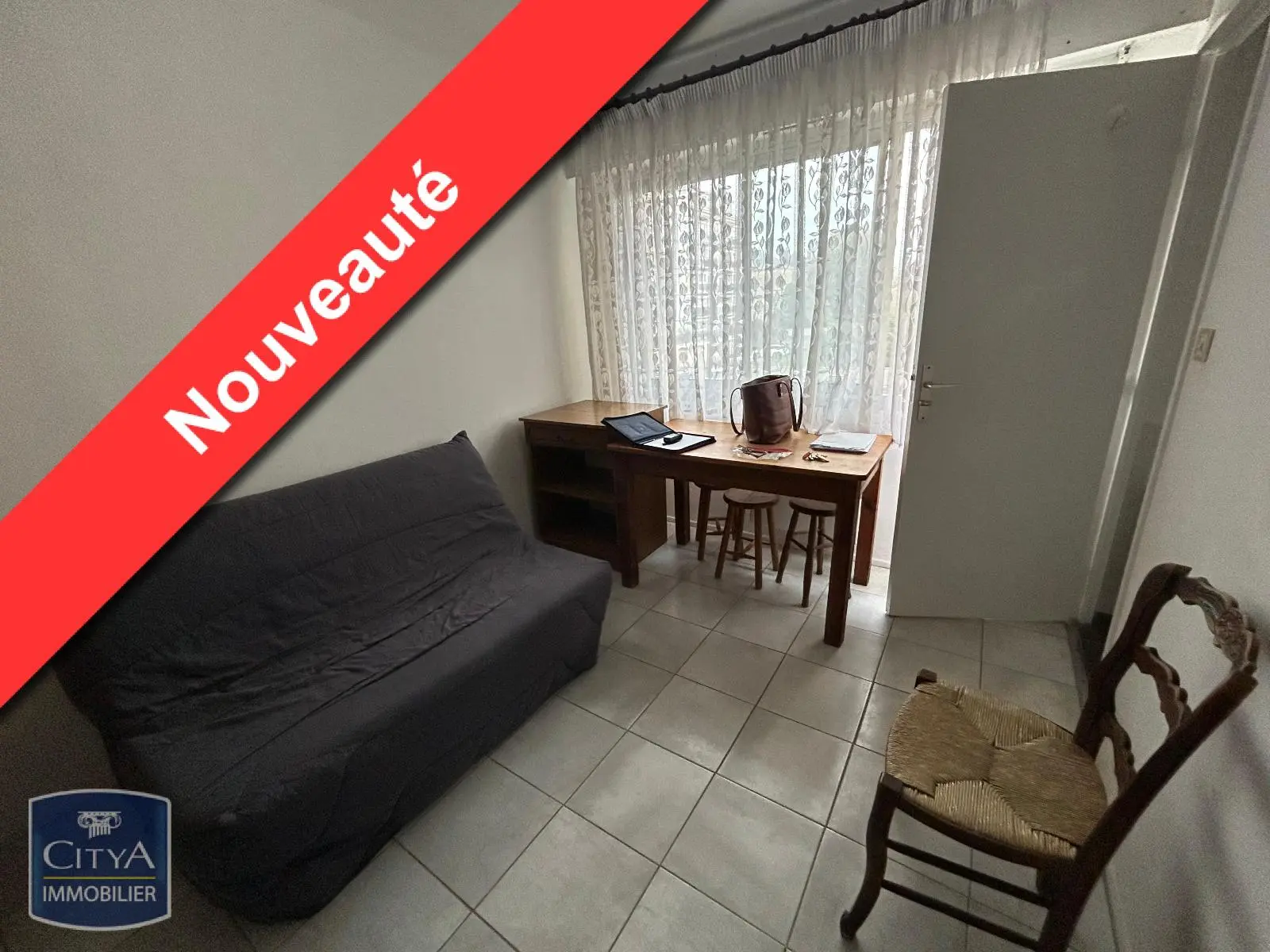 Photo 1 Appartement 1 pièce 14.54m²