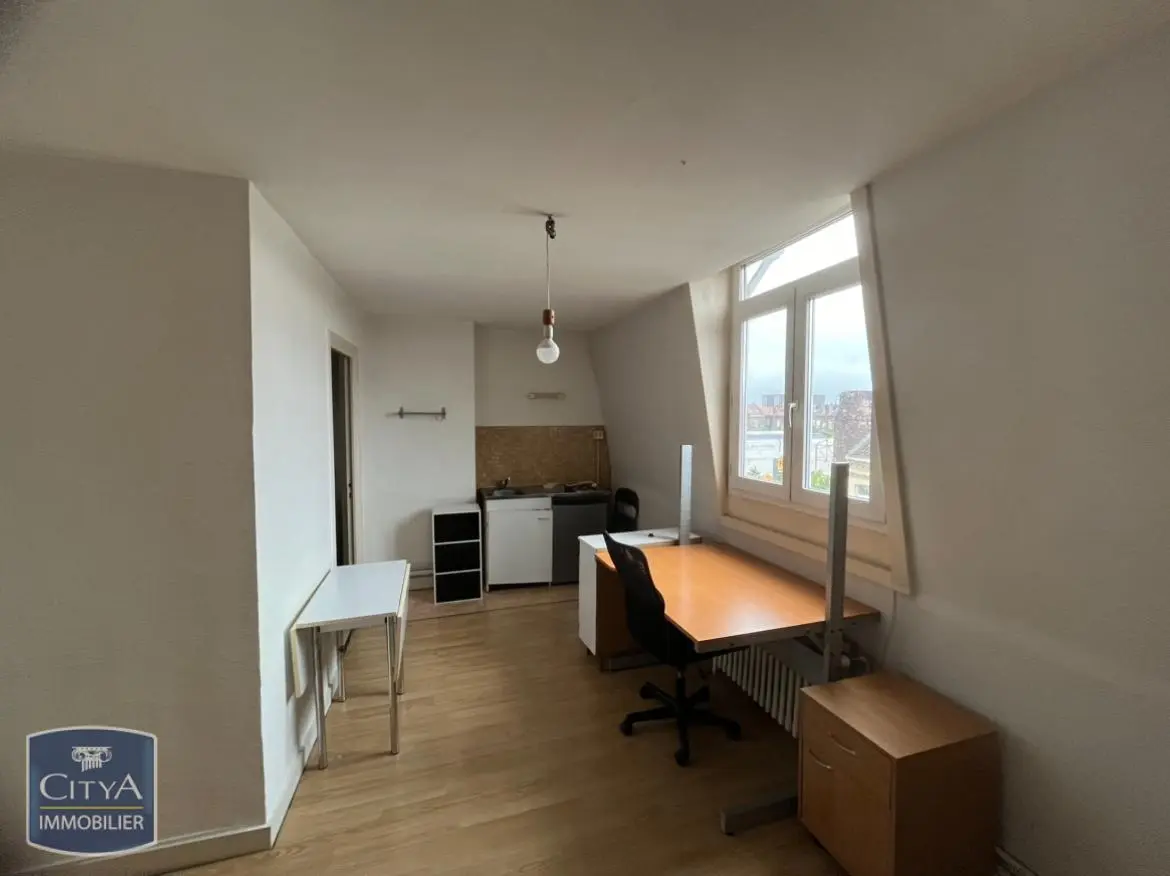 Photo 1 Appartement 1 pièce 21.74m²